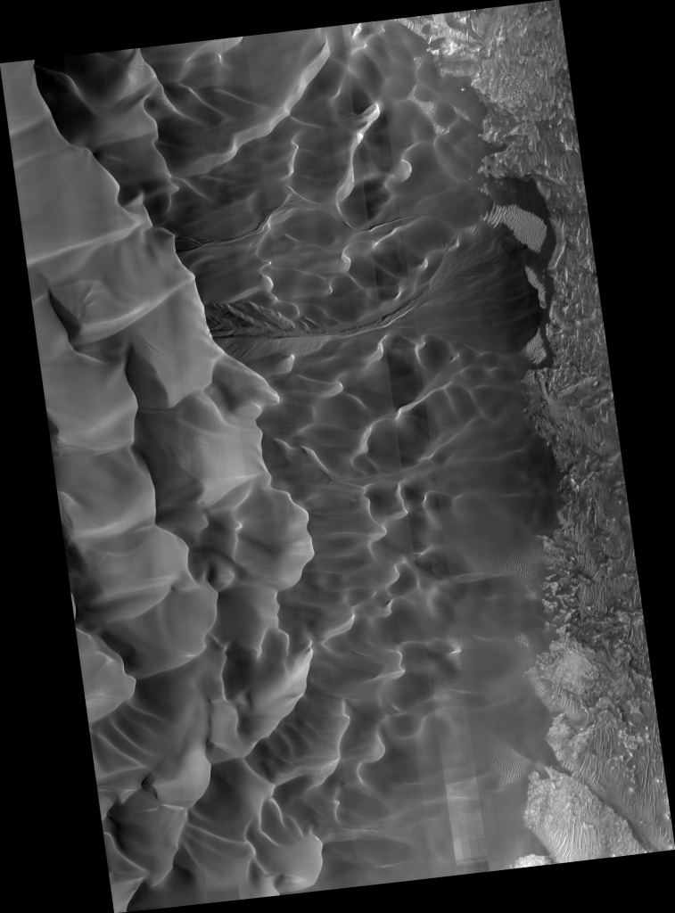 This image of Matara crater shows the sinuous elegance of its sand dunes.  Image credit: NASA/JPL-Caltech/UArizona