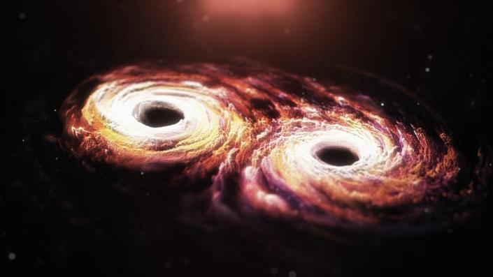 Artist's impression: Supermassive black holes at the heart of every galaxy spiral around each other, sending gravitational shock waves through the Universe