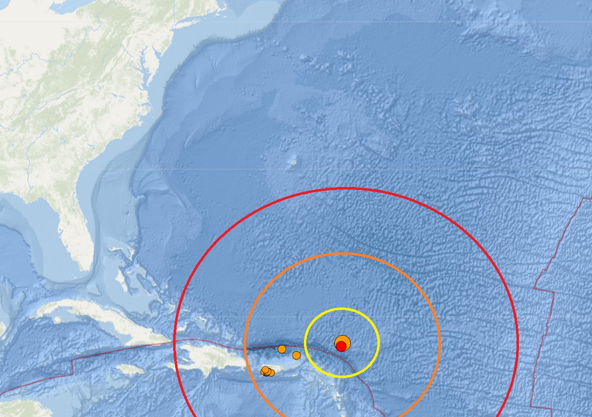 An unusually strong earthquake hit the North Atlantic today at the orange dot inside the colored concentric circles;  a moderate aftershock hit the red dot nearby.  Image: USGS